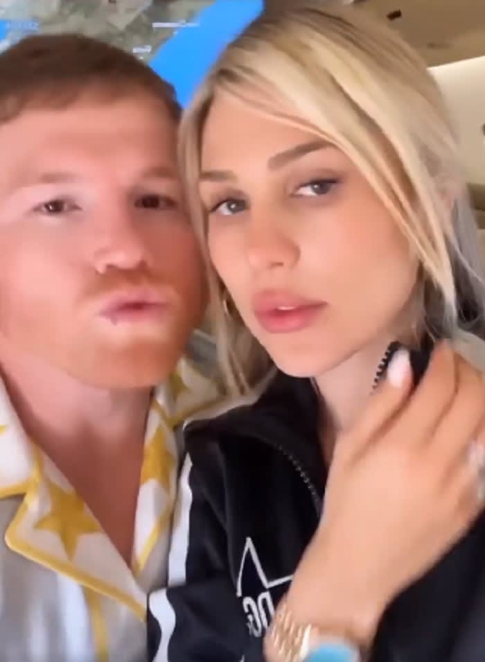 Canelo gets affectionate with his wife, but she seems to ignore him