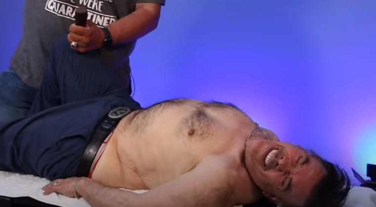He writhes in pain