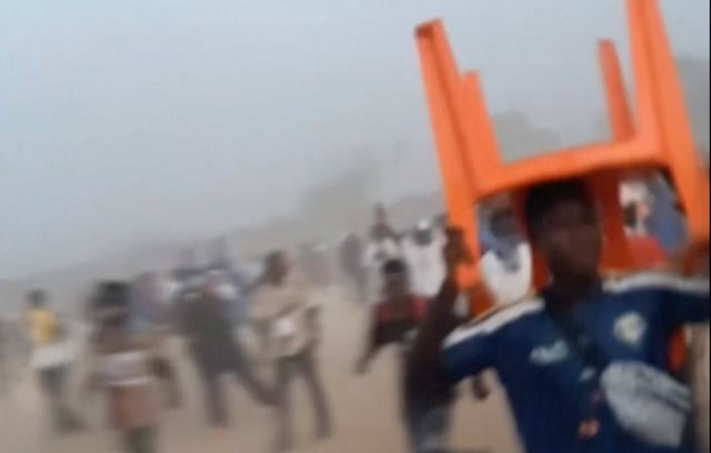 56 dead reported in a stampede after clashes at a soccer match in Guinea