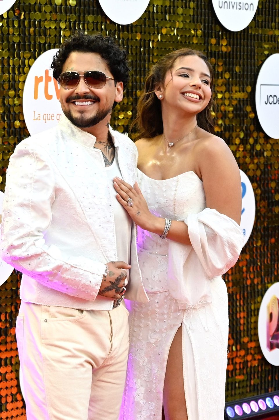 Ángela Aguilar celebrated one of the awards of the night at Premios Juventud 2026. Credit: Mezcalent.