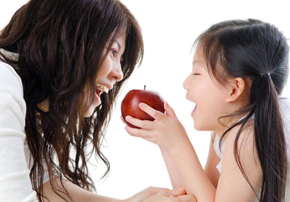 Red delicious, mother, daughter, eating