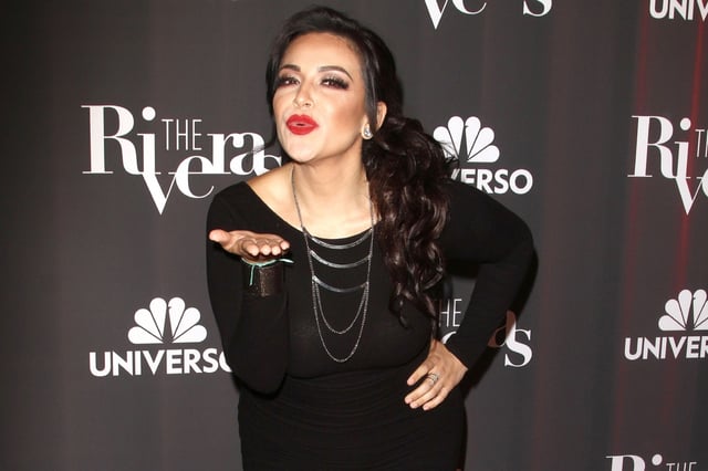 Jacqie Rivera shows off her curves in a waist trainer
