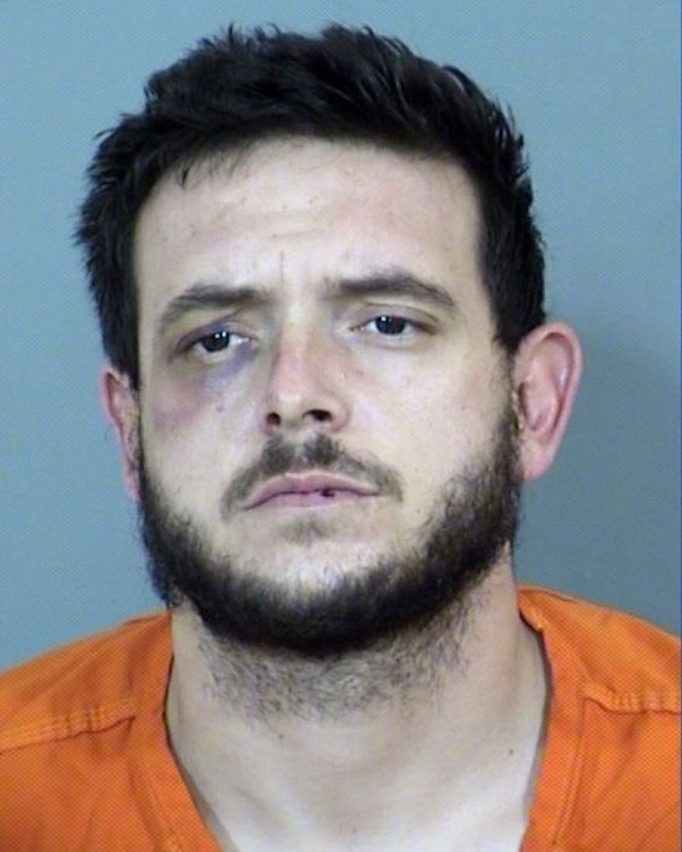 Brandon Luján is accused of killing his mother, father and brother