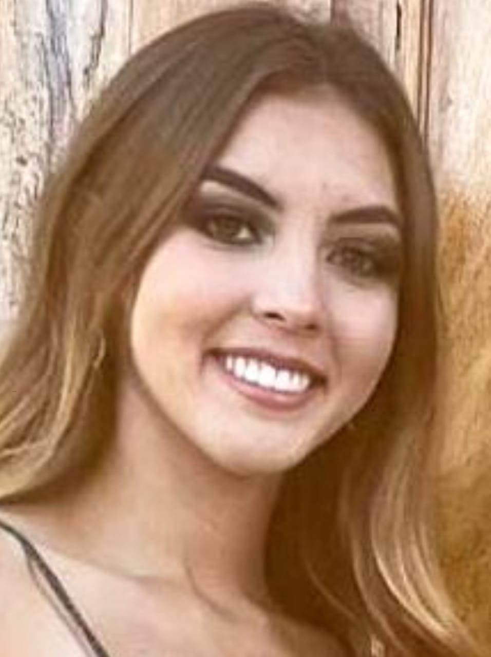Who shot Leslie Cota to death?