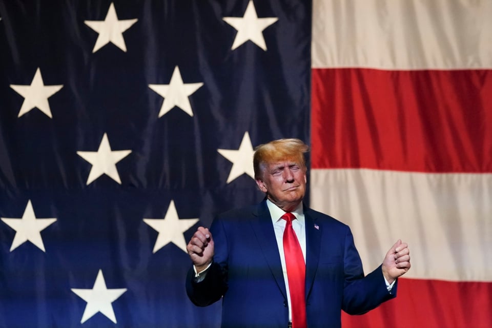 Donald Trump is defiant in first public appearances since he was indicted
