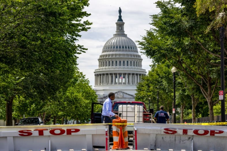 Authorities identify the gunman who crashed his car into a barricade at the Capitol and then killed himself