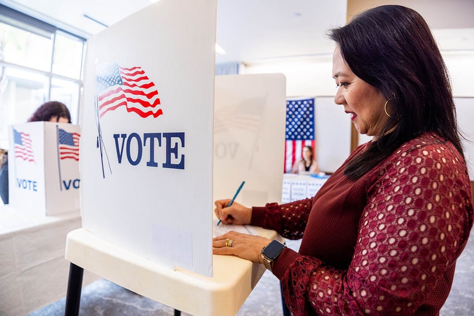 polling place, woman, politics, USA, strict voting laws