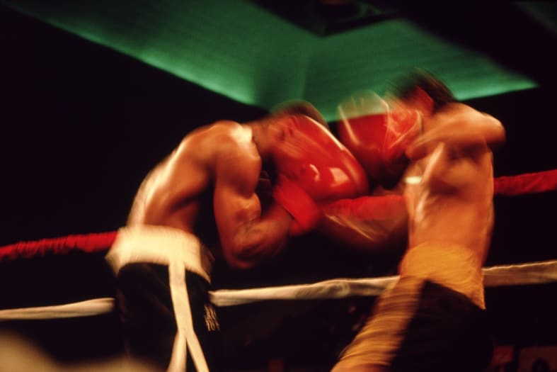 Embarrassing! Boxer loses a fight when he vomits all over the ring