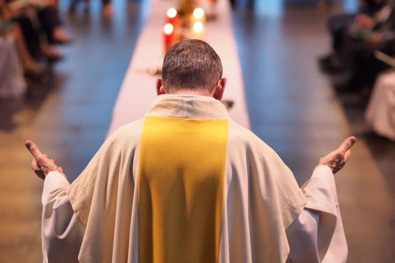 Priest fines followers $50 for cell phone use