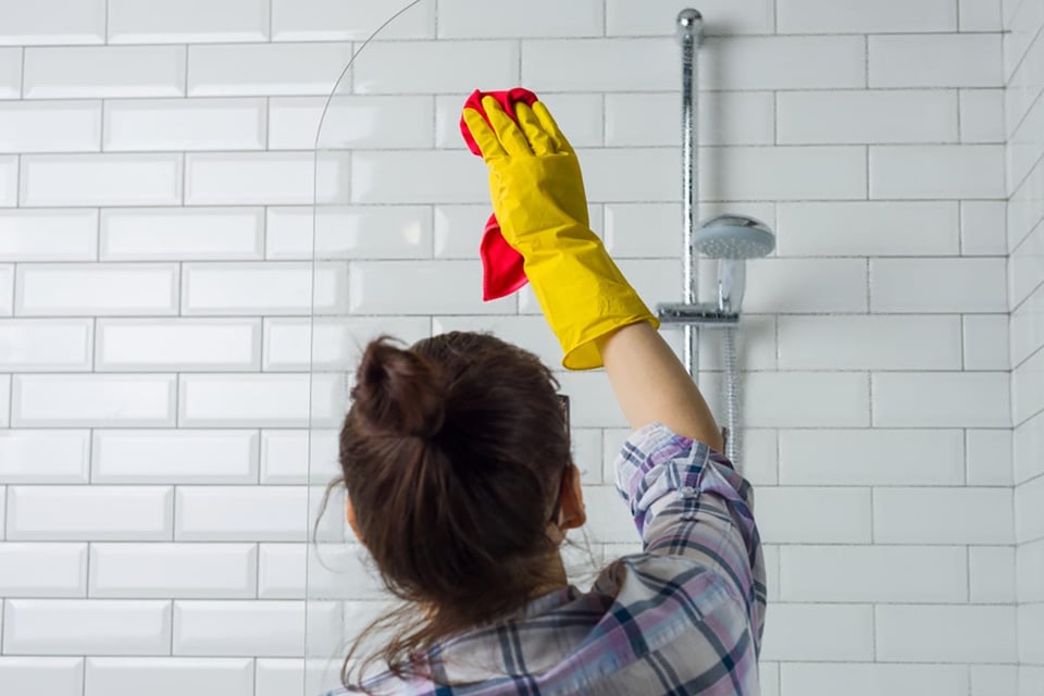 How to clean a bathroom, woman, shower, tub