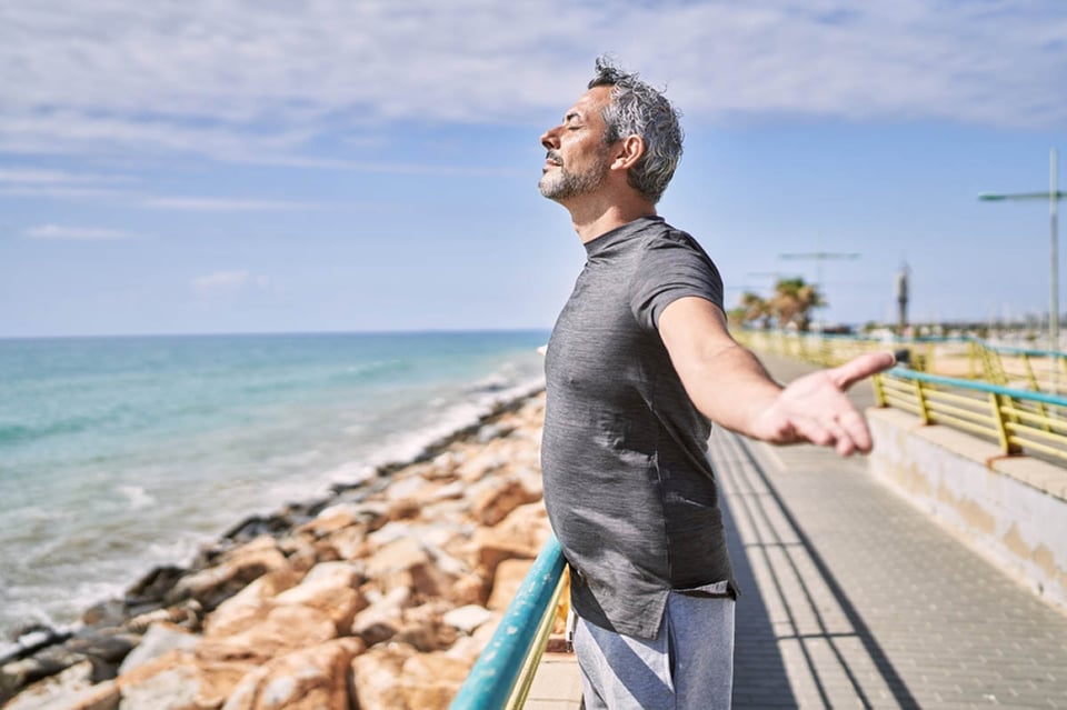 Middle age, hispanic, man, wearing sportswear, breathing