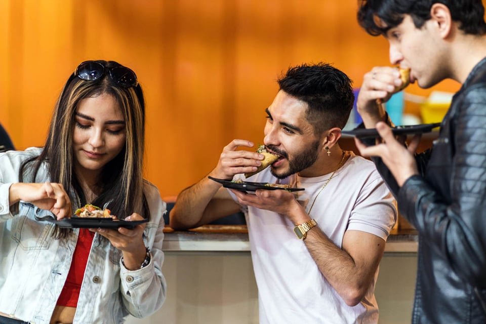 People eating Meican food