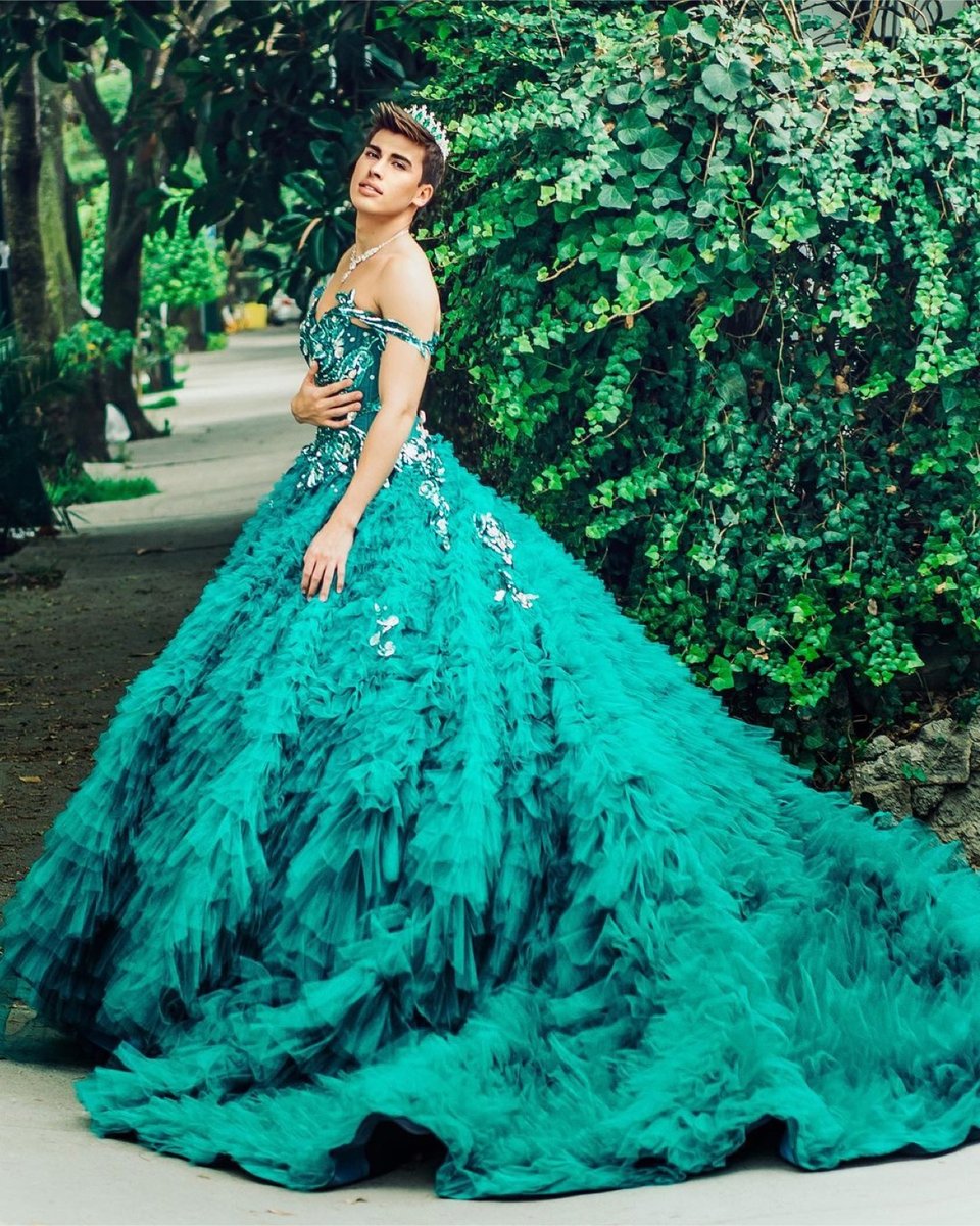 La Divaza, quinceañera dress, long dress, man wearing dress, crown