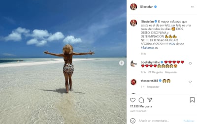 In a bikini she shows off her rear in a bikini in the style of JLo