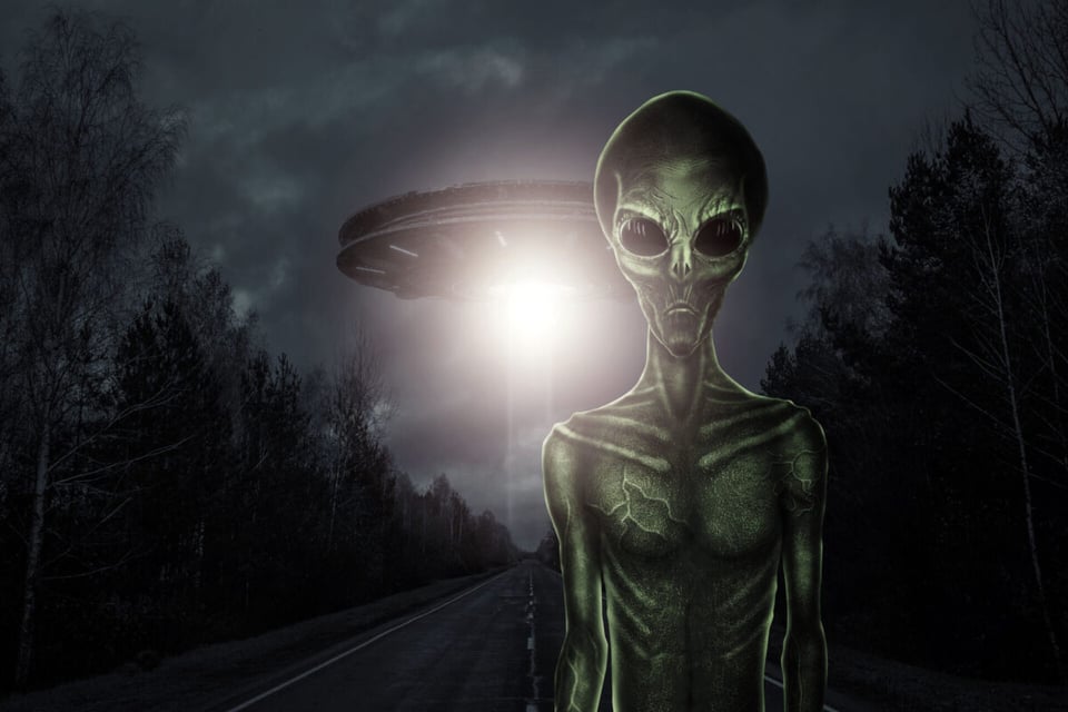 Alien standing in highway
