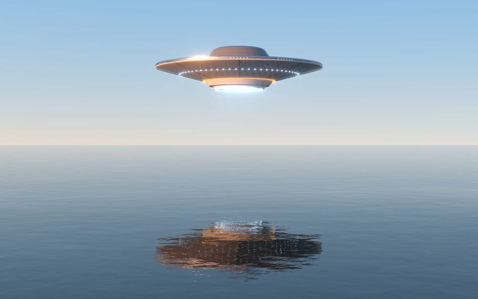 UFO flying over the sea
