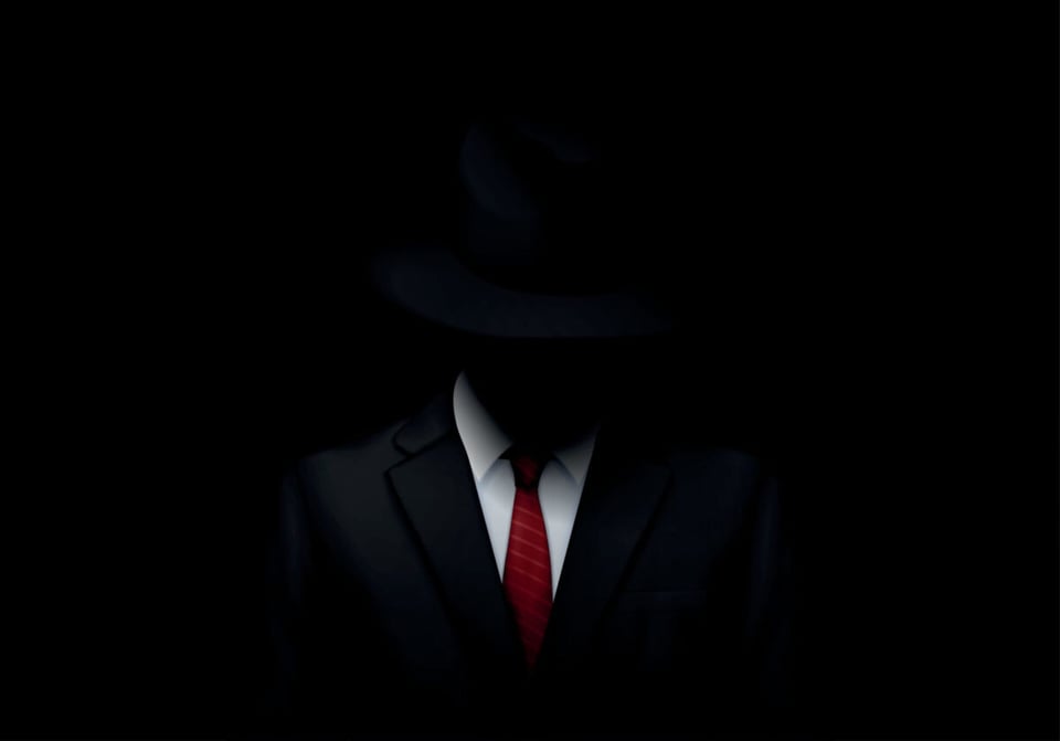 Un hombre con traje sin rostro