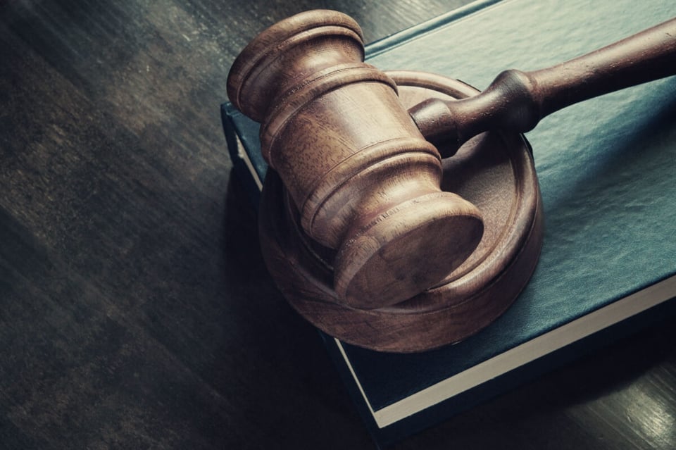 A gavel and book as an idea of Skylar Law