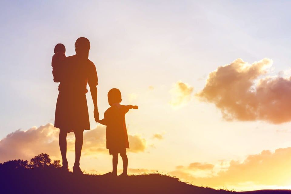 A woman with two children