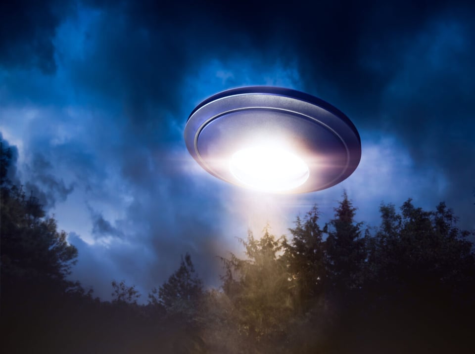 UFO Flying over forest