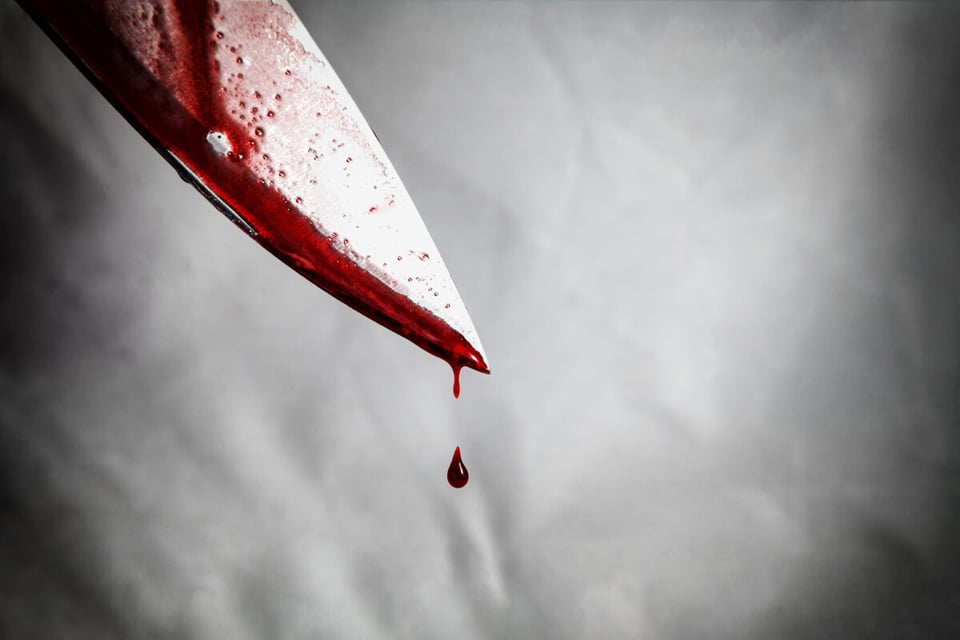 Knife dripping blood
