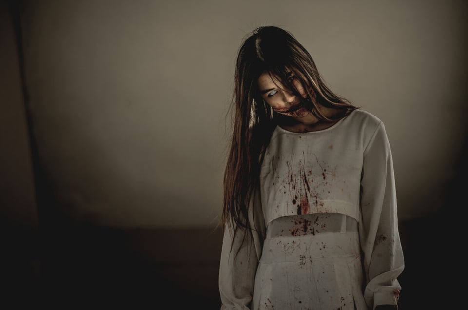 A cannibal woman in white