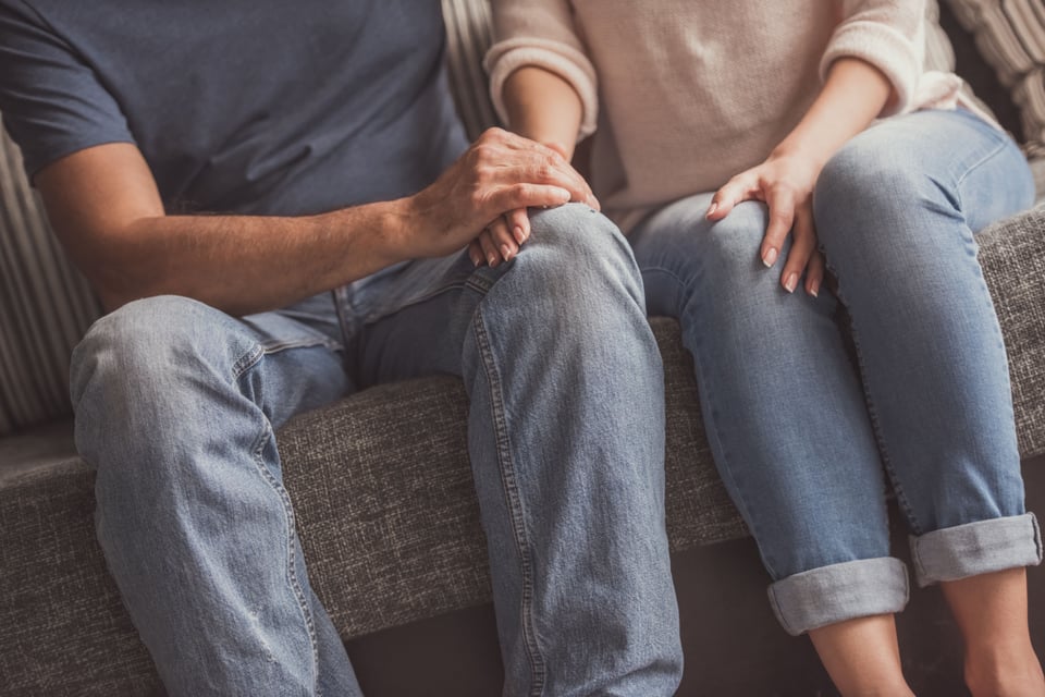Hands of wife and husband together