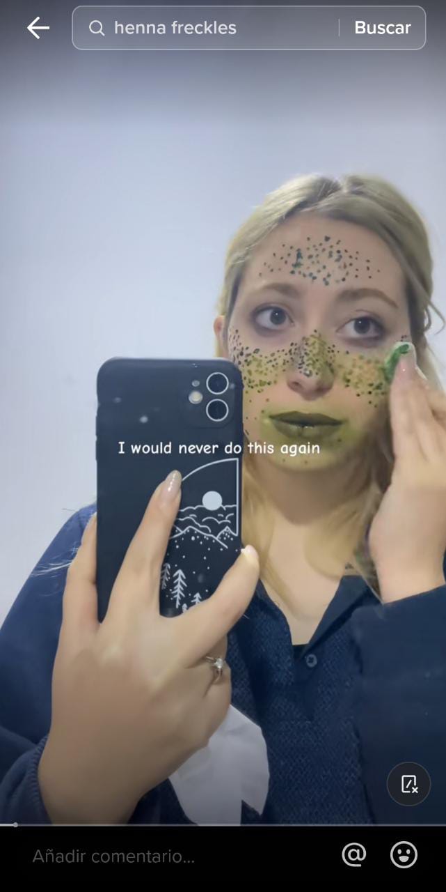 After trying to follow the trend of fake freckles, mom ends up with a green face, claiming she looks like Fiona