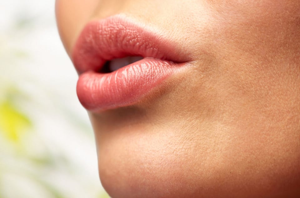 close up of young woman lips, Yailin La Mas Viral's plastic surgery,