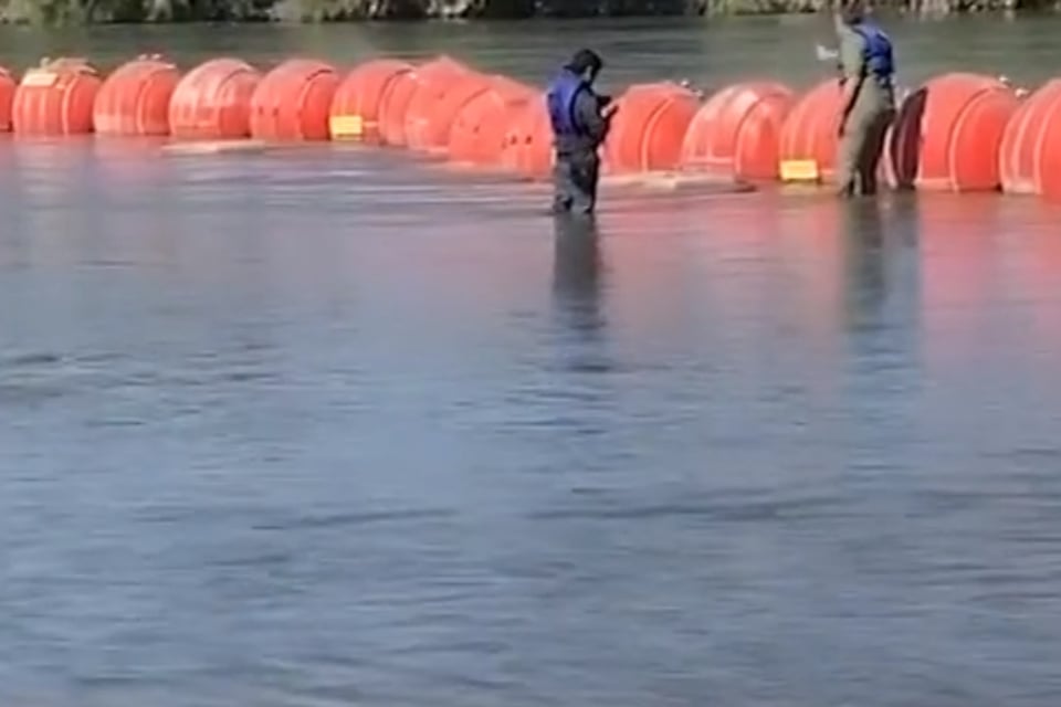 Buoys in the river, Controversy, New legal process, Immigration policy, Crossing