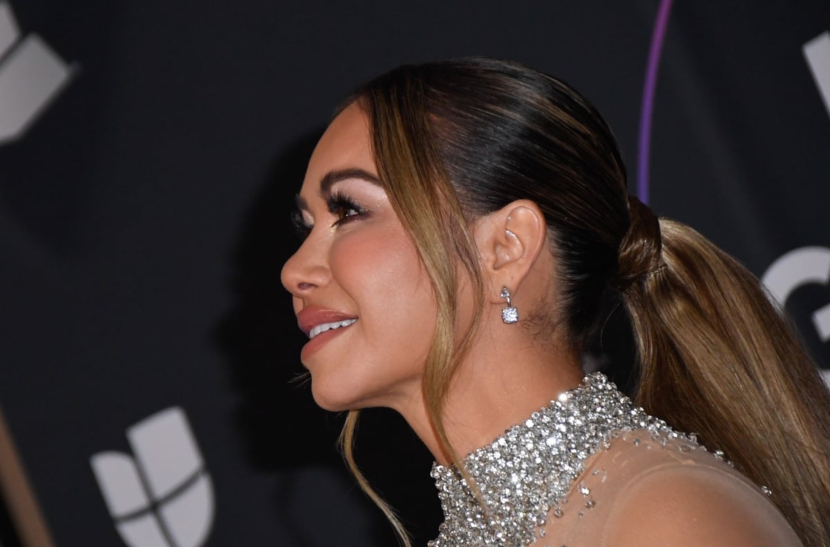 Chiquis Rivera shows off her figure in concert and some say that she’s using her body
