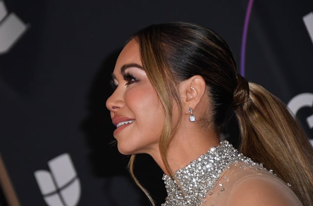 Chiquis Rivera shows off her figure in concert and some say that she’s using her body