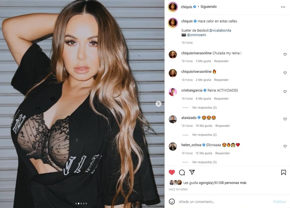 Chiquis opens blouse: Shows what is underneath