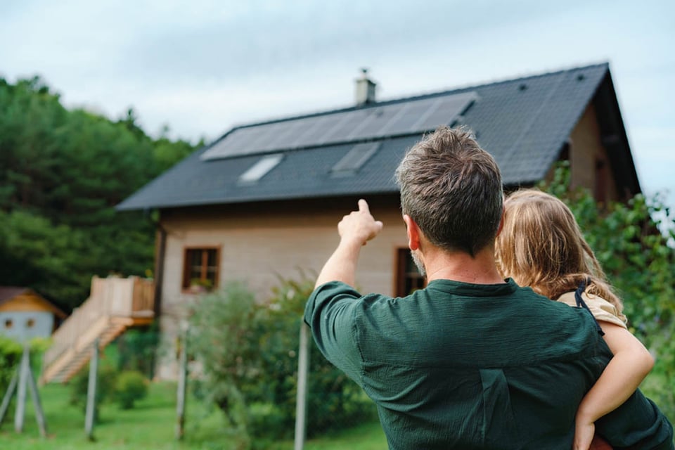 father, child, inspecting roof