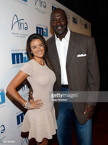 LAS VEGAS, NV - APRIL 05: Charlotte Bobcats owner Michael Jordan (R) and fiancee Yvette Prieto arrive at the 12th Annual Michael Jordan Celebrity Invitational Gala At ARIA Resort &amp; Casino on April 5, 2013 in Las Vegas, Nevada. (Photo by Isaac Brekken/Getty Images for Michael Jordan Celebrity Invitational)