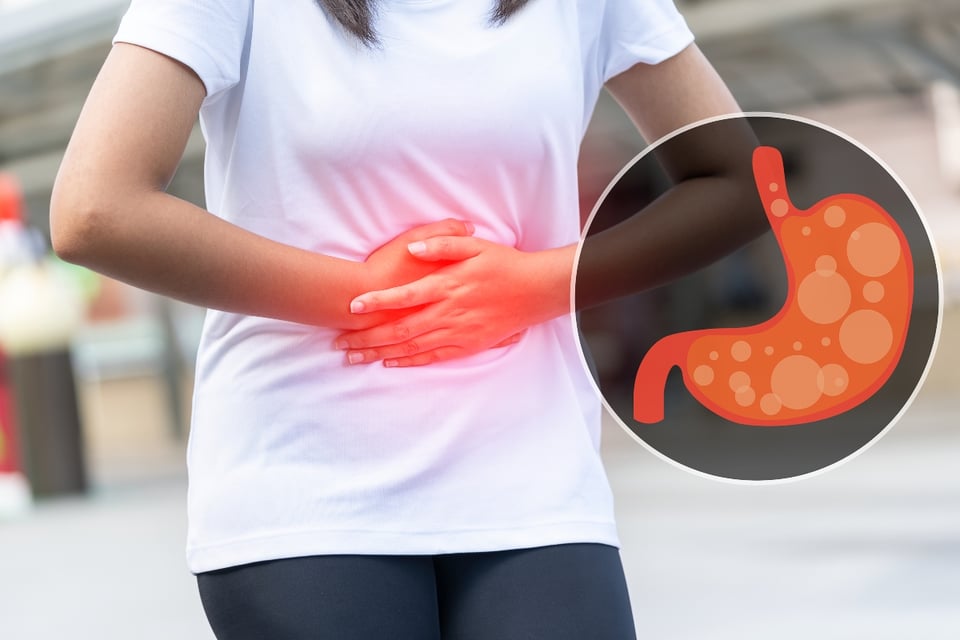 Signs identify swelling: "It may be the gas produced by our intestinal microbes"