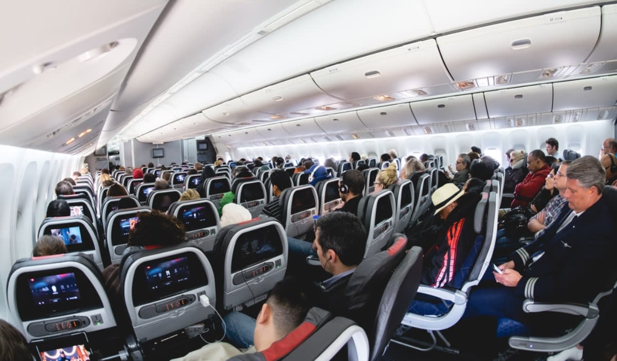 American Airlines flight diverted when unruly passenger tried to open the door