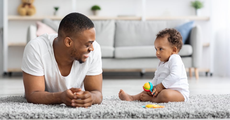 Dad playing with his son