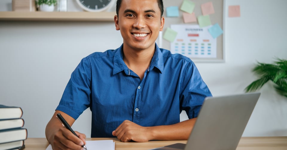 A student smiling