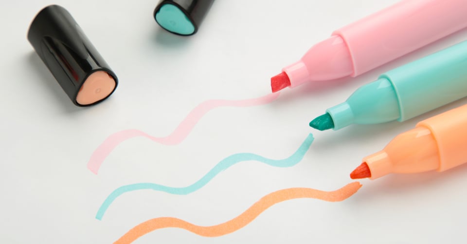 Some school supplies that serve to highlight text
