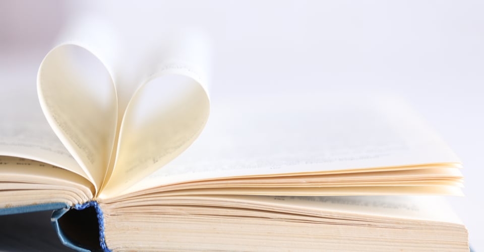 A book that has pages that form a heart