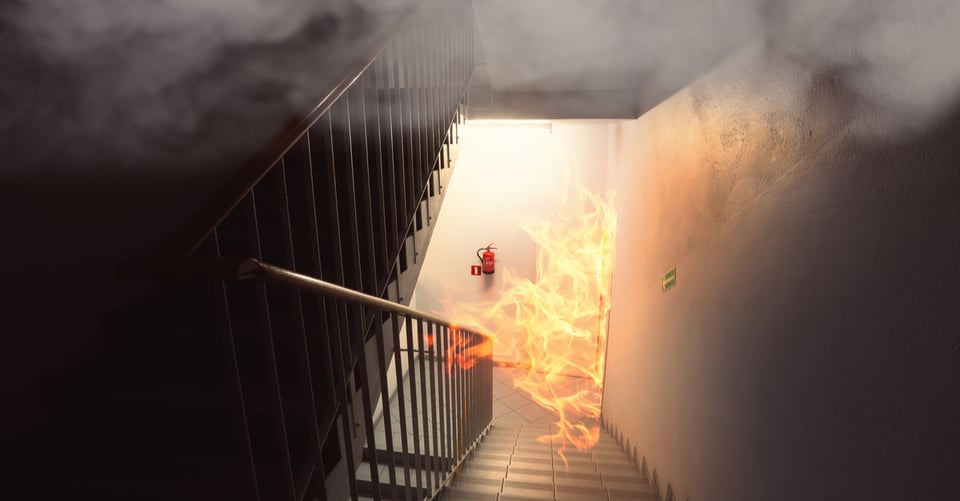 Fire inside a building near the stairs made by a criminal