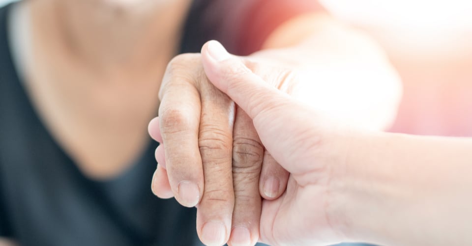 A woman giving help to a person