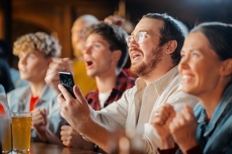People watching a game, Sports betting tips