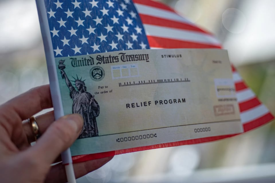 Cheque, dinero, pago, EEUU, payment, MundoNOW