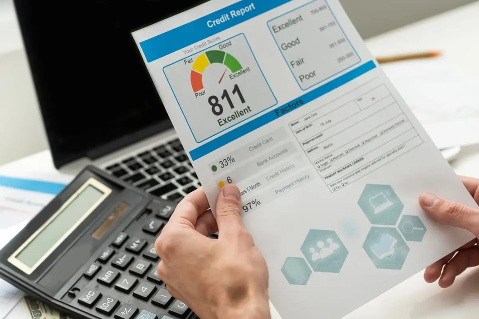 paper with credit score in hand