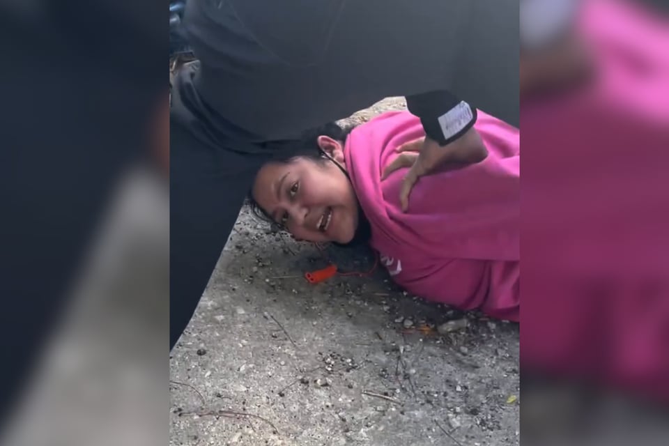 Photo: @erynfreepress via Storyful — ICE Detains Two Women Outside a School in Chicago