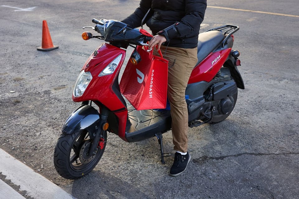 bonos por millas DoorDash