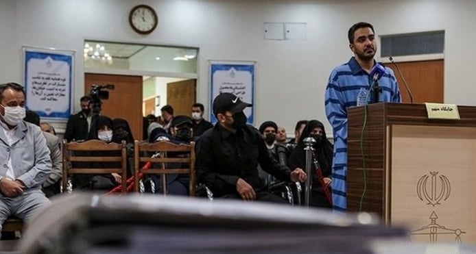 Iran executes, publicly hangs wrestler linked to protests