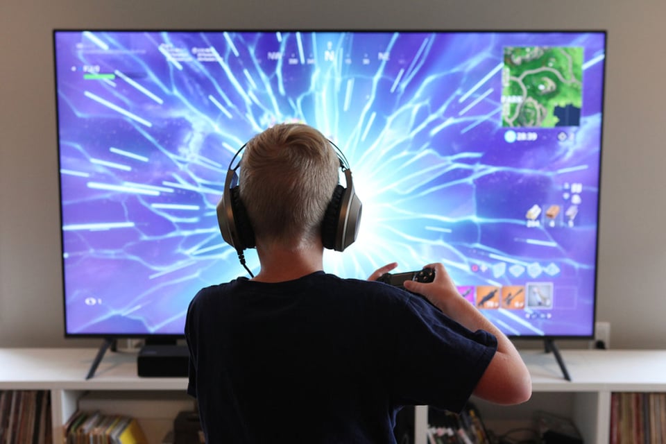 Teen playing a video game